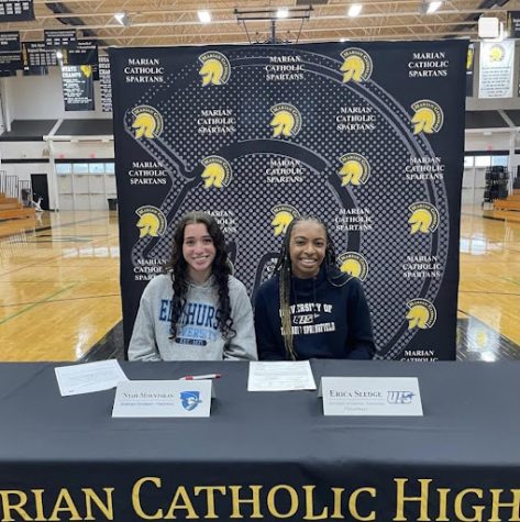 Nyah Moustakas ‘22 and Erica Sledge ‘22 sign to 
continue their athletic careers at their respective schools.
