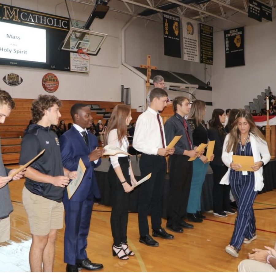 New Eucharistic Ministers Recognized During First School Mass