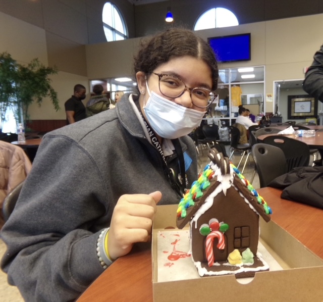 Freshman Payton Bester customizes her cookie condo with a candy cane.